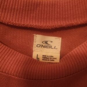 O'Neill Sweater.  Color Canyon Clay ( It's like a dusty rose peach color) Size L